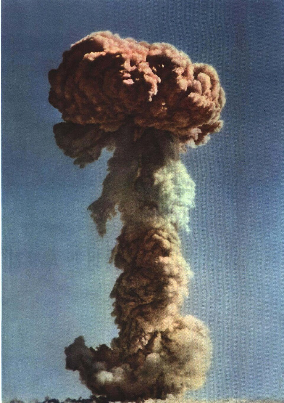 The fireball and mushroom cloud rising over the Lop Nur test site in Xinjiang following the detonation of China's first atomic device on 16 October 1964.