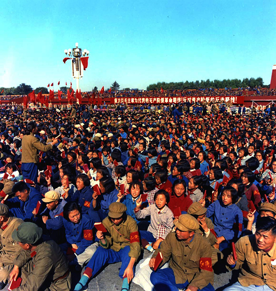 Student Red Guards wearing armbands and holding vinyl-bound copies of Quotations from Chairman Mao packed into Tiananmen Square during the autumn 1966 inspection rallies.